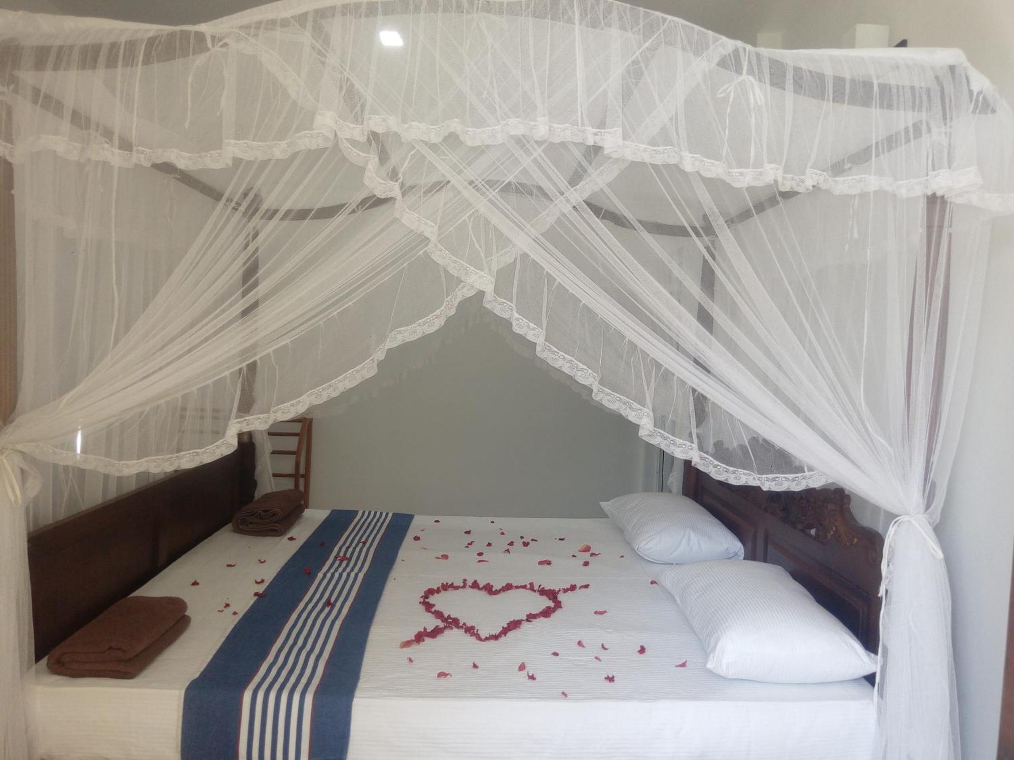 Minara Guest House Mirissa Habitación foto